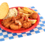 8 PC. Coconut Shrimp Plate with french fries, coleslaw, garlic bread, & hush puppy