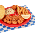 8 PC. Fried Shrimp Plate with french fries, coleslaw, garlic bread, & hush puppy