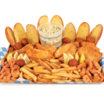 8 PC. Fried Cod & 16 Fried Shrimp with french fries, coleslaw, garlic bread, and hush puppies.