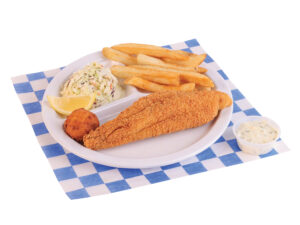 1pc. fried catfish plate served with french fries, coleslaw, a slice of garlic bread, a hush puppy, and a lemon wedge served on a white plate. Placed in a white and blue checkered paper.