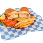 Fish Sandwich with lettuce, tomato, tartar sauce, & french fries