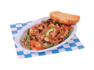 Fish & Shrimp Mexican Style includes 1 Grilled Cod Filet, 6 Grilled Shrimp with the choice of one side, and bread. On a white and blue checkered paper.