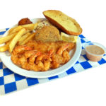 Fisherman's Platter served with one fried cod, six fried shrimp, 1 fried crab cake, french fries, coleslaw, hush puppy, garlic bread, and slice of lemon.