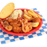 Shrimp Platter includes 4 fried shrimp, 4 coconut shrimp, 4 grilled shrimp, french fries, coleslaw, garlic bread, & hush puppy