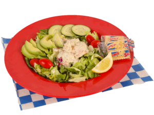 Avocado Shrimp Salad served with six slices of avocado & crackers