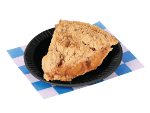 A slice of Dutch Apple Pie on a small black plate. Placed on a blue and white checkered paper.