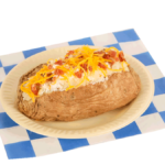 Baked Potato served with butter, sour cream, cheese, & bacon bites