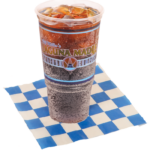 Large soda on a white and blue checkered paper.