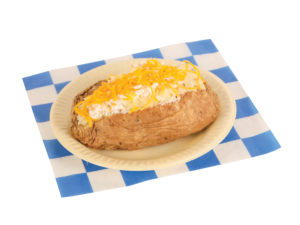 baked potato with sour cream and cheese on a blue and white checker paper