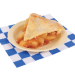 Slice of a plated apple pie on a blue and white checkered paper