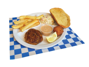 1 PC Grilled Crab Cake Plate with french fries, colelsaw, garlic bread, hush puppy, slice of lemon plated on a red plate on top of a white and blue checker paper