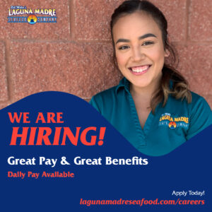 Laguna Madre logo. We are hiring! Great Pay & Great Benefits. Daily Pay Available. Apply Today! Lagunamadreseafood.com/careers the image features a Laguna Madre employee standing against a brick wall slip image with verbiage at the bottom.